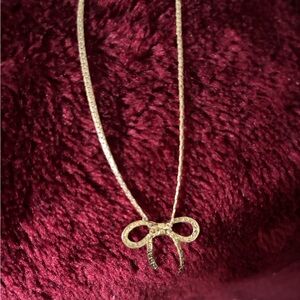 Avon Gold Bow Pendant Necklace